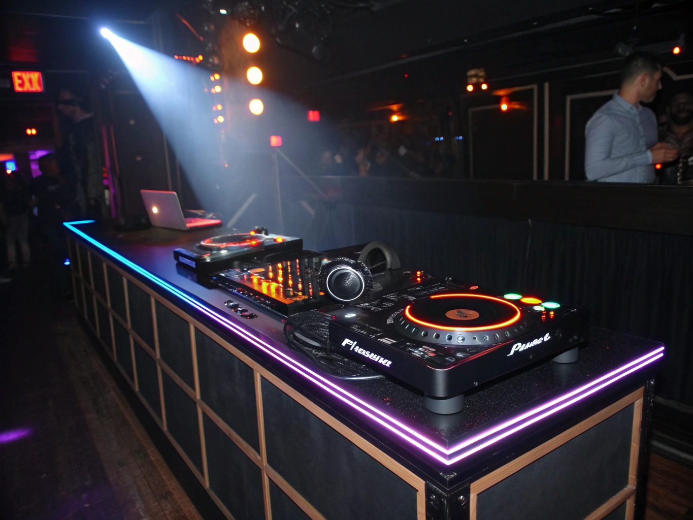 Professional DJ equipment and lighting setup